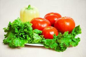 Fresh red tomatoes close-up photo