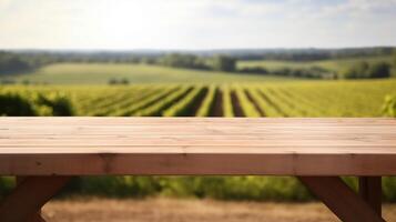 A French vineyard serves as the clouded foundation for an cleanse wooden table. Creative resource, photo