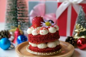 Festive red velvet cake with accessories for Christmas and new year event. photo