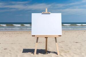 White blank artist frame on a small wooden easel on summer sea beach background with copy space. Advertising mockup artboard for pictures or artwork. Painting frame template banner. photo