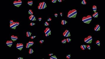 Gambie drapeau sur 3d cœur. boucle animation avec drapeau cœurs isolé sur une transparent Contexte video