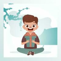 A happy child boy sits in a lotus position and holds a gift box with a bow in his hands. Holidays theme. Vector illustration in cartoon style.