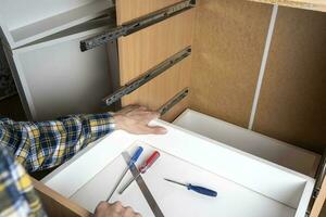 replacement of the drawer guide, repair of home furniture photo