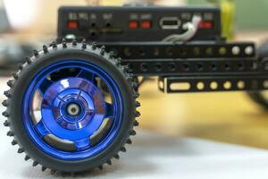 programmable children's robot car in the form of a platform on wheels photo