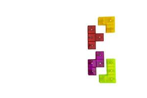 three-dimensional colored tetris figures isolated on a white background, space for copying. photo