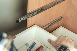 replacement of the drawer guide, repair of home furniture photo