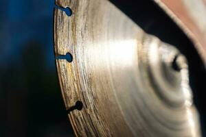 close-up of a saw with a disc for cutting concrete and paving slabs photo