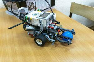 programmable children's robot assembled from designer parts photo