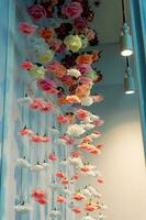 an artistic spatial composition of rose flowers suspended in the air photo