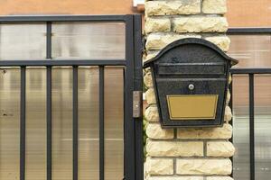 elegant mailbox on the door of a private house photo