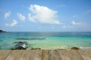 wooden walkway in the beach with nice sea view. photo