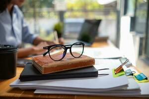 Businesswoman hands working on stacks of paper documents to search and review documents piled on table before sending them to board of directors to use  correct documents in meeting with Businessman photo