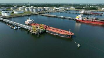 Liquid Cargo Transporter Ship Unloading Crude Oil to a Fuel Depot video