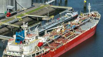 Liquid Cargo Transporter Ship Unloading Crude Oil to a Fuel Depot video