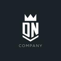 DN logo with shield and crown, initial monogram logo design vector