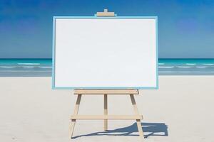 White blank artist frame on a small wooden easel on summer sea beach background with copy space. Advertising mockup artboard for pictures or artwork. Painting frame template banner. photo