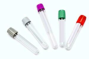 Top view of colorful blood tubes for keep and safe blood collection to checkup glucose and all virus on white background. Each colors caps used for keep different types of blood and liquid. photo