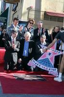 Arnold Schwarzenegger Sigourney Weaver James Cameron  City Officials at the Hollywood Walk of Fame Ceremony for James CameronEgyptian Theater SidewalkLos Angeles  CADecember 18 20092009 photo