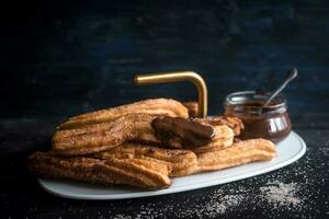 Sweet chocolate churros photo