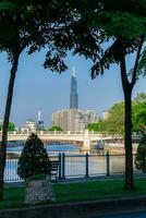 Ho Chi Minh, Viet Nam - 7 April 2023 Ho Chi Minh street in the afternoon sunshine, view to Landmark 81 photo