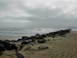 el interminable playa a el del Norte mar hvidbjerg varado blavand Dinamarca foto