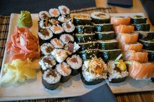 tasty, healthy, healthy sushi served at a resteraunt dinner photo