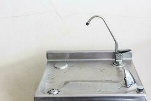 Public drinking water faucet, drink dispenser photo