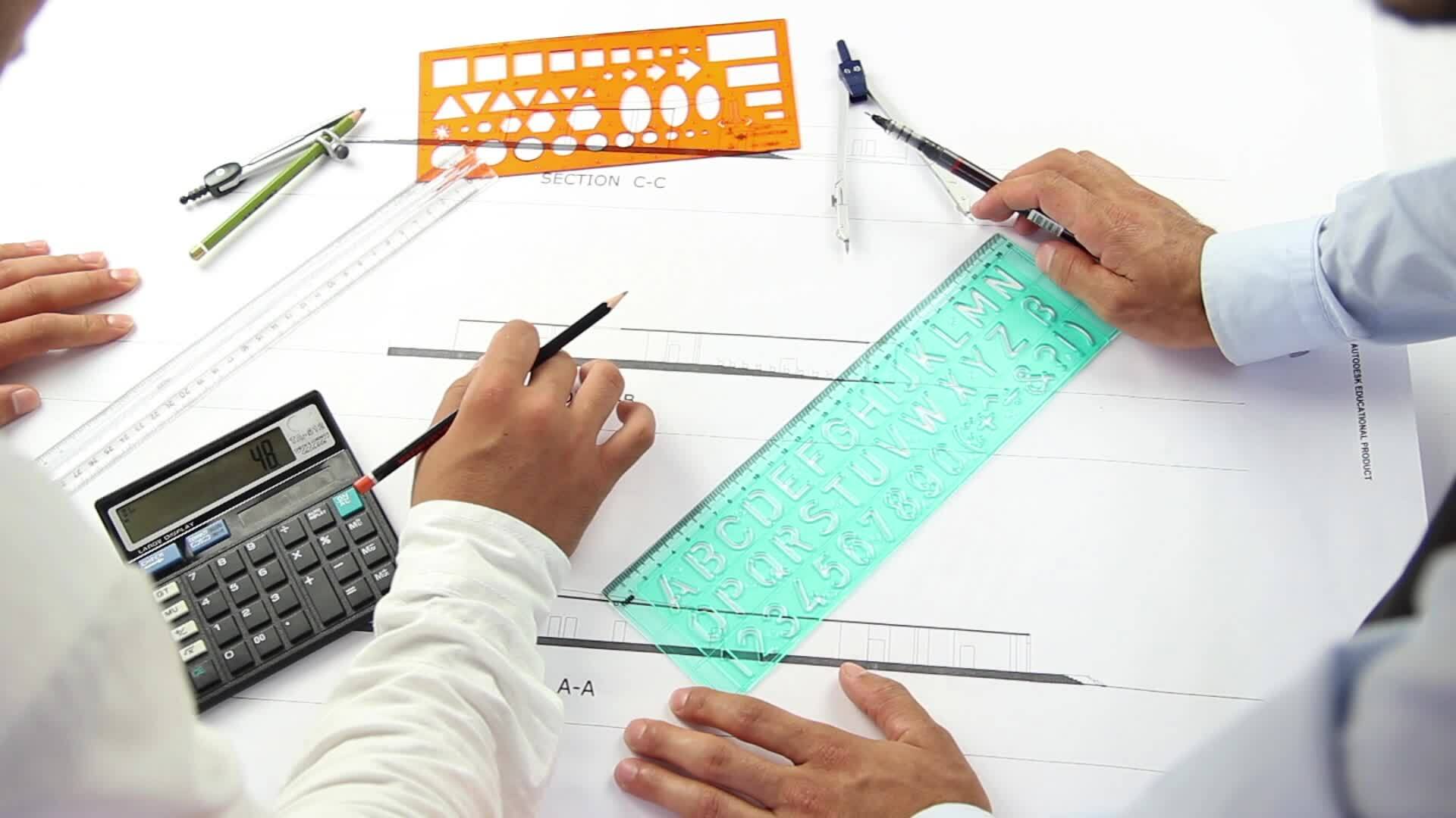 Architects discussing with using pencil on sketch 23576424 Stock Video