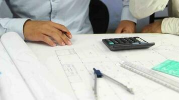 Architect working construction plan in office meeting video