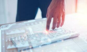 business project planning, man poinnting to keyboard to analysing data chart or diagram, photo