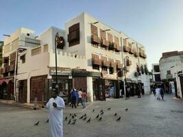 Jeddah, Saudi Arabia, April 2023 - A view of the old and historical part of the city of Jeddah, Saudi Arabia.  These buildings are located in Balad area of Jeddah. photo