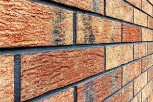 Decorative brick. Walls made of old -style brick photo