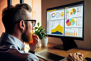 young businessman sitting in front of a computer screen, staring intently at their website's analytic dashboard, Show the website as a vibrant, media platforms, advertising channels. photo