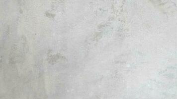 Seamless texture of white cement wall a rough surface, with space for text,concrete floor,old vintage style for a background. photo