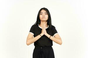 Folding arms and Begging Gesture of Beautiful Asian Woman Isolated On White Background photo