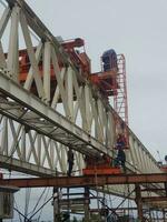 Jakarta, Indonesia in April 2019. Some mechanics are assembling the launcher gantry. photo