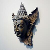 A white wall sculpture of a face with Gautama buddha head as mural for home decor etc. . photo