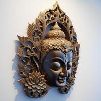 A white wall sculpture of a face with Gautama buddha head as mural for home decor etc. . photo