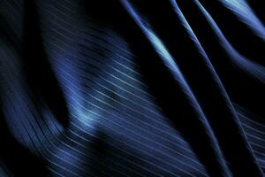 Dark black and gray blurred gradient and line of cloth or fabric background has a little abstract light. photo