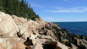 Rocky coast in Acadia, Maine in sunny day with blue sky video