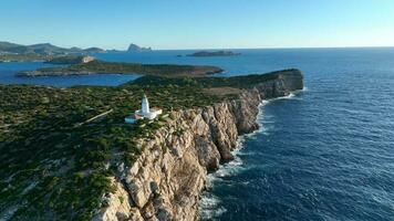 Lighthouse in Ibiza at the Top of a Tall Cliff Aerial View video