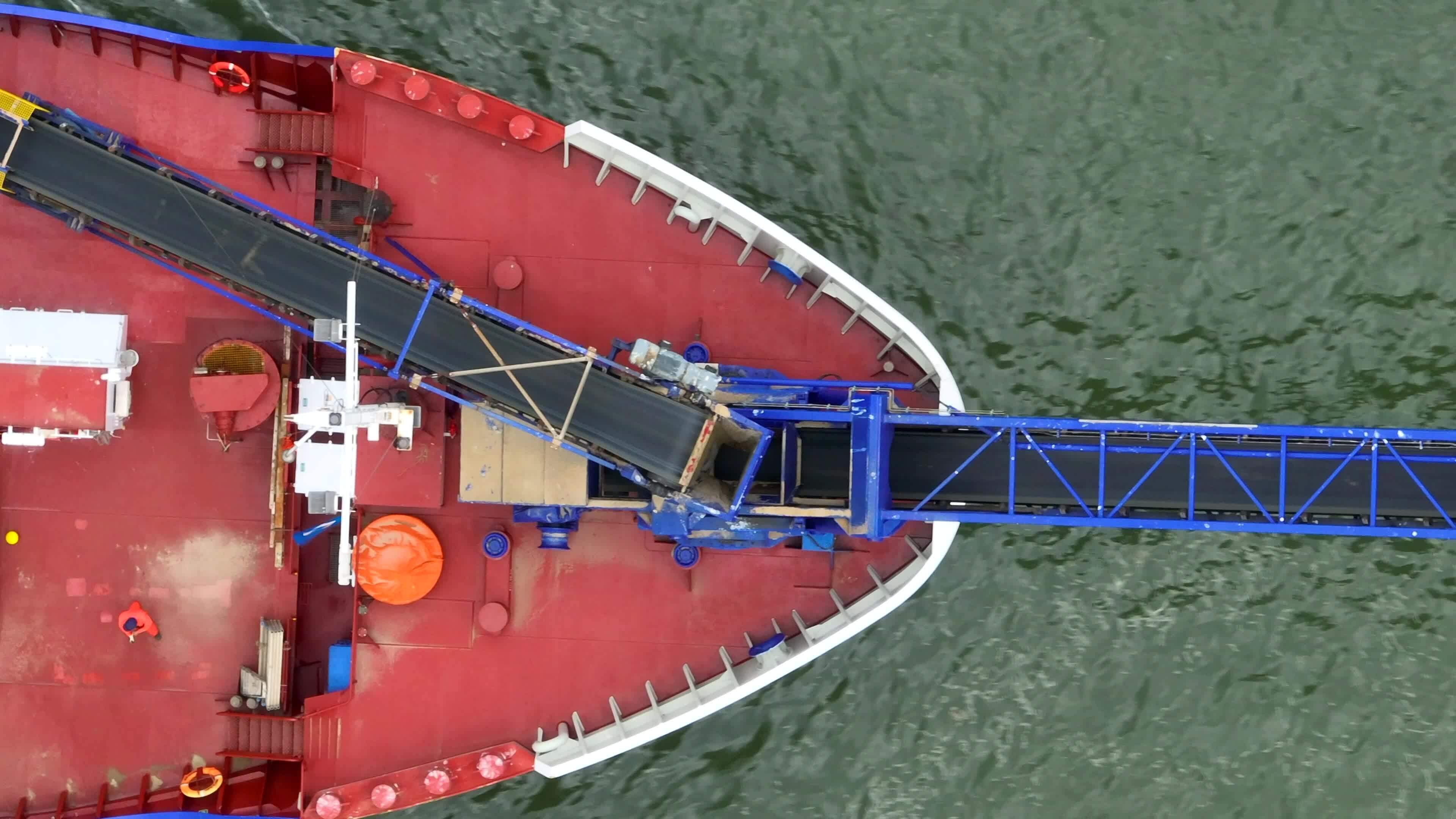 Self Unloading Barge Carrying Cargo At Sea 23585228 Stock Video at Vecteezy