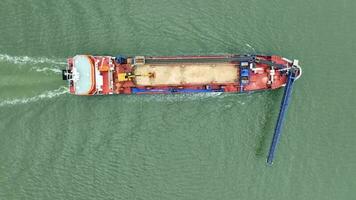 Bird's Eye View of a Self Unloading Barge Carrying Cargo At Sea video
