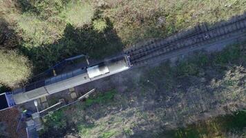 Cargo Train Bird's Eye View Departing a Station video