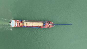 Bird's Eye View of a Self Unloading Barge Carrying Cargo At Sea video
