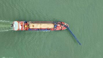 Self Unloading Barge Carrying Cargo At Sea video