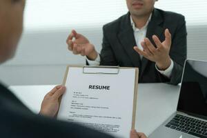 Executives accept job application documents and read job applicants resume to match the position. company publishes vacancies online to find human. Human resource, interview, letters, competence. photo