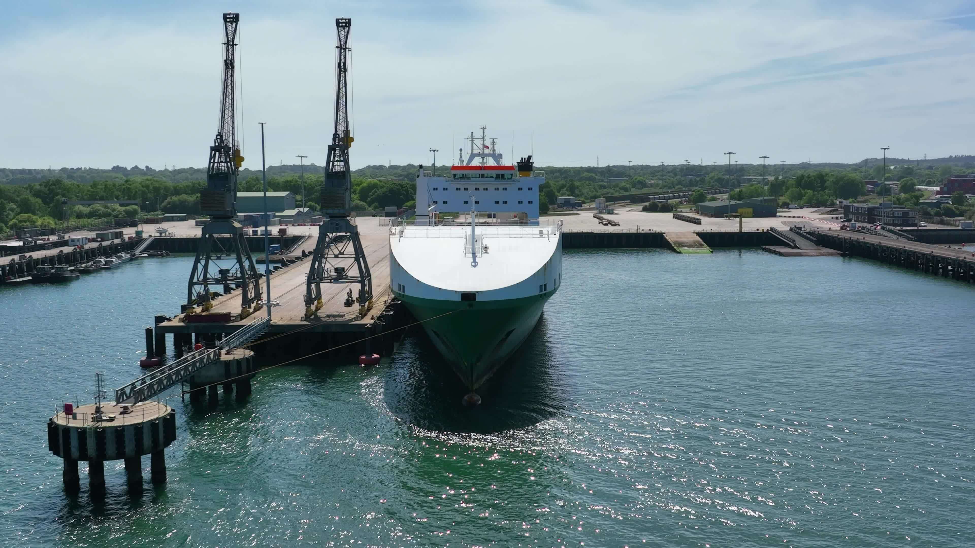 a-roll-on-roll-off-ferry-at-port-awaiting-vehicle-loading-23587031