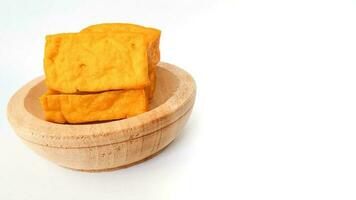 Yellow Tofu, also known as Takwa Tofu, is tofu that has a yellow color, which is caused by adding turmeric or synthetic dyes . Yellow tofu is a typical food of the City of Kediri, Indonesia photo