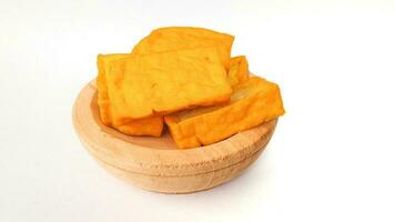 Yellow Tofu, also known as Takwa Tofu, is tofu that has a yellow color, which is caused by adding turmeric or synthetic dyes . Yellow tofu is a typical food of the City of Kediri, Indonesia photo